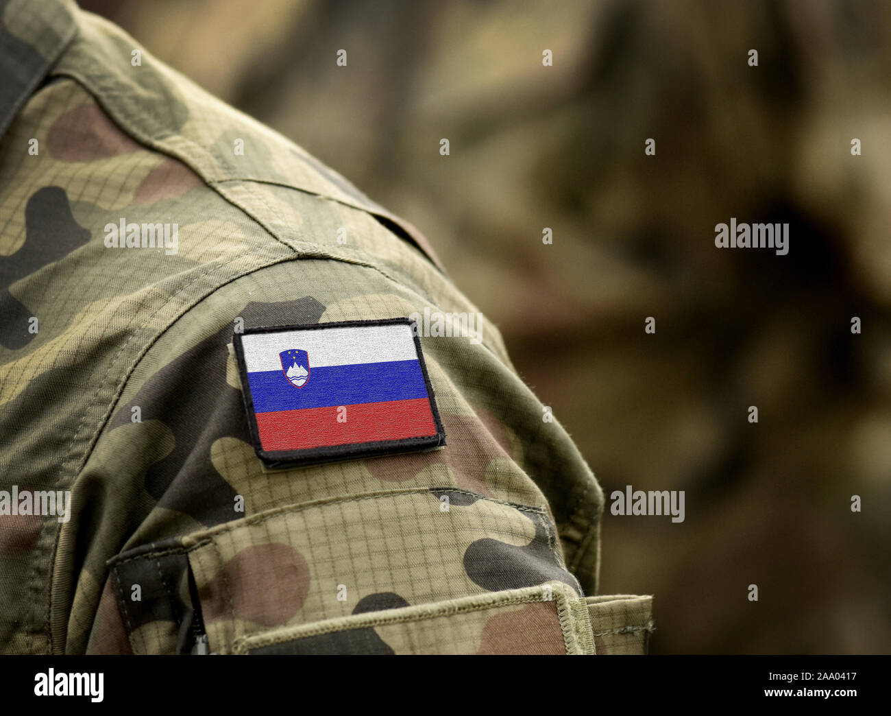 Flag of Slovenia  on military uniform. Army, armed forces, soldiers. Collage. Stock Photo