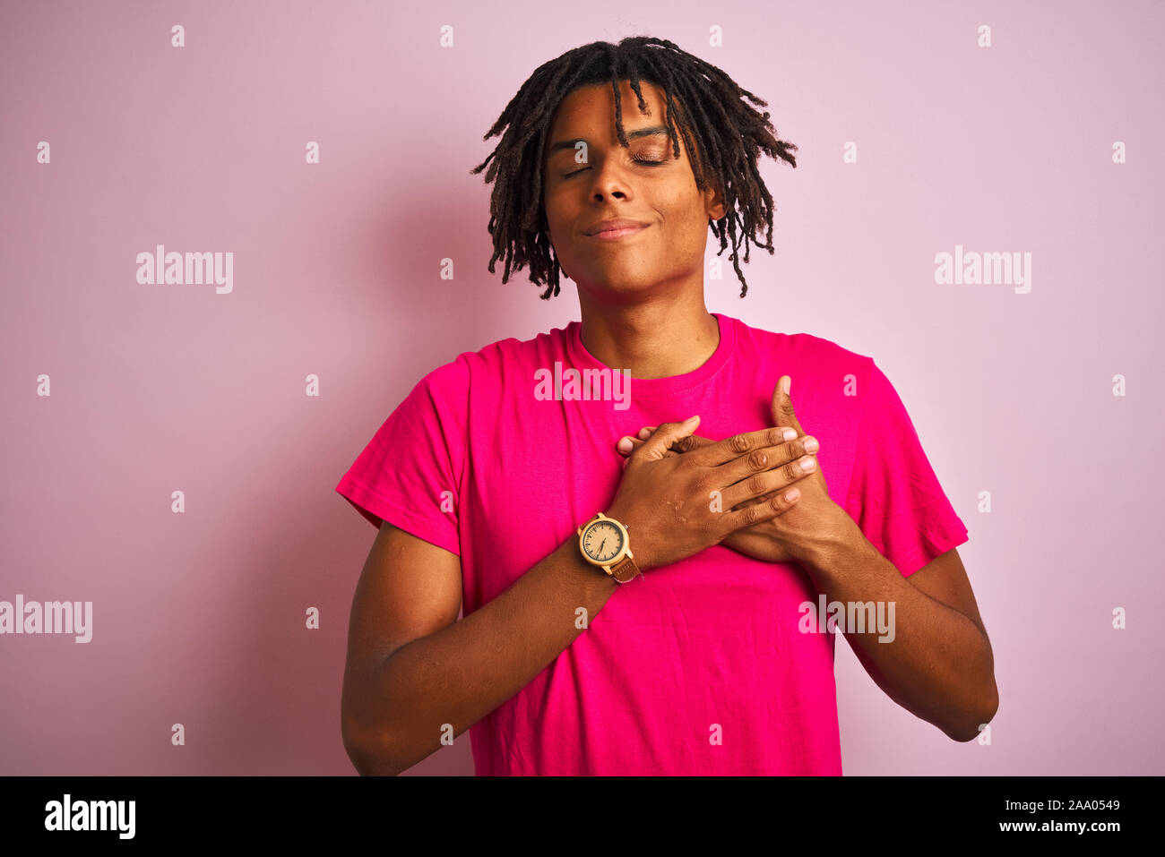 Dreadlocks Chest Afro american man with dreadlocks wearing t-shirt standing over ...