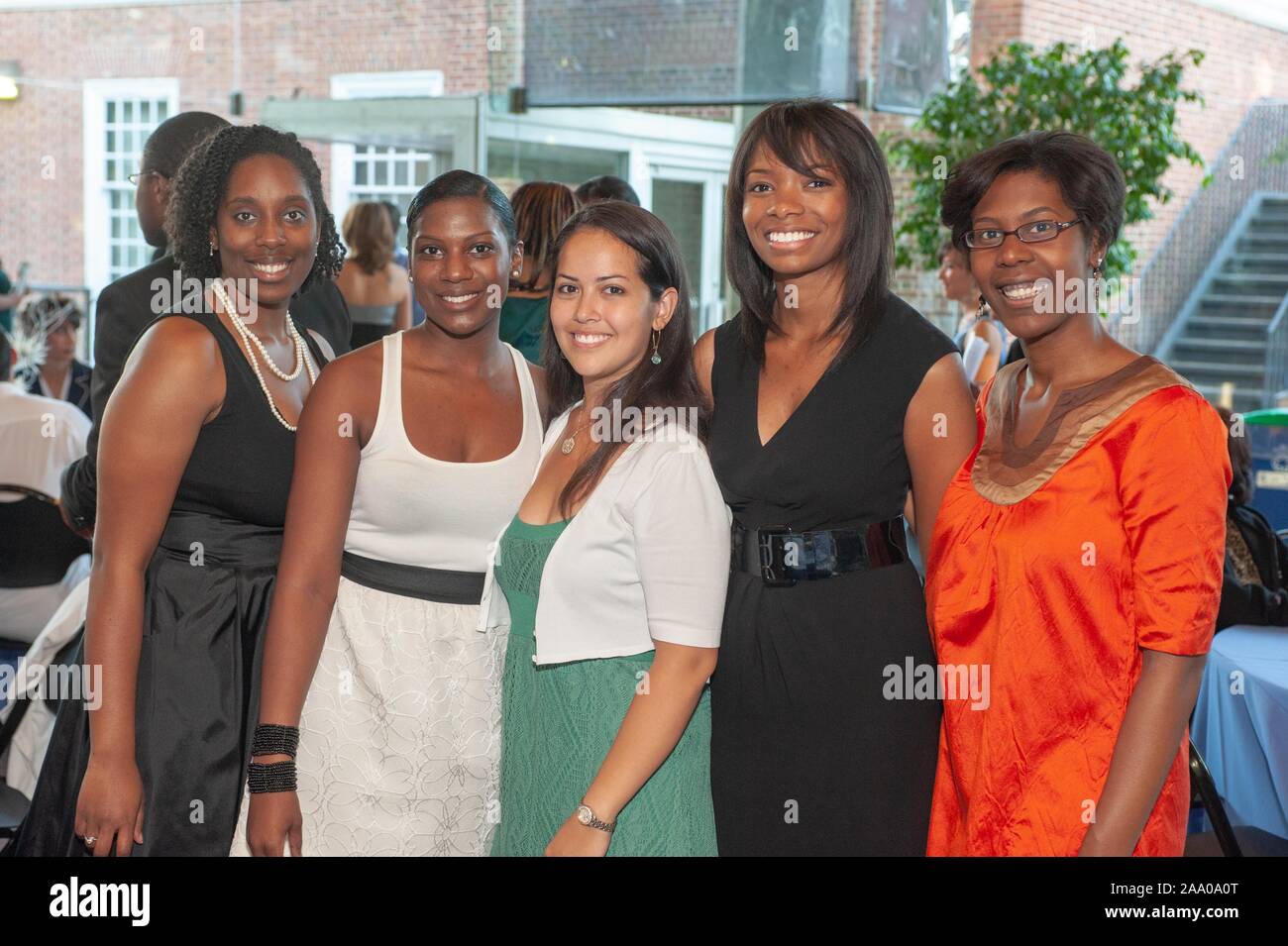 Students and faculty participate in a Black and Latino Graduation celebration, hosted by the Office of Multicultural Affairs at the Johns Hopkins University in Baltimore, Maryland, May 19, 2009. From the Homewood Photography collection. () Stock Photo