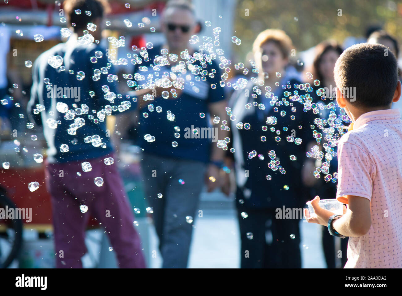 Istanbul, Turkey - September-28.2019: Child worker in Istanbul selling soap bubble machine Stock Photo