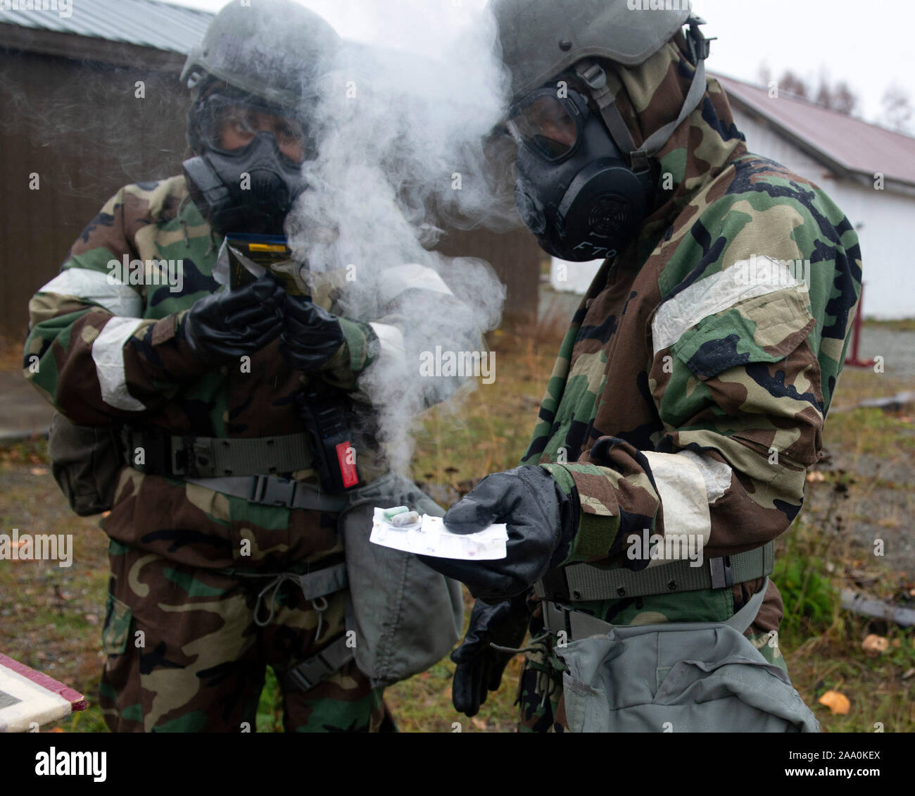U.S. Airmen assigned to the 673d Air Base Wing use a chemical detection kit in a simulated hazardous environment during Polar Force 20-1 at Joint Base Elmendorf-Richardson, Alaska, Oct. 9, 2019. Designed to test JBER’s mission readiness, Polar Force 20-1 is a two-week exercise that hones Airmen’s skills and experience when facing adverse situations. Airmen refined their contingency tactics, techniques and procedures in support of the Pacific Air Force’s Agile Combat Employment concept of operations. Agile Combat Support excellence yields multi-domain operations success. Stock Photo