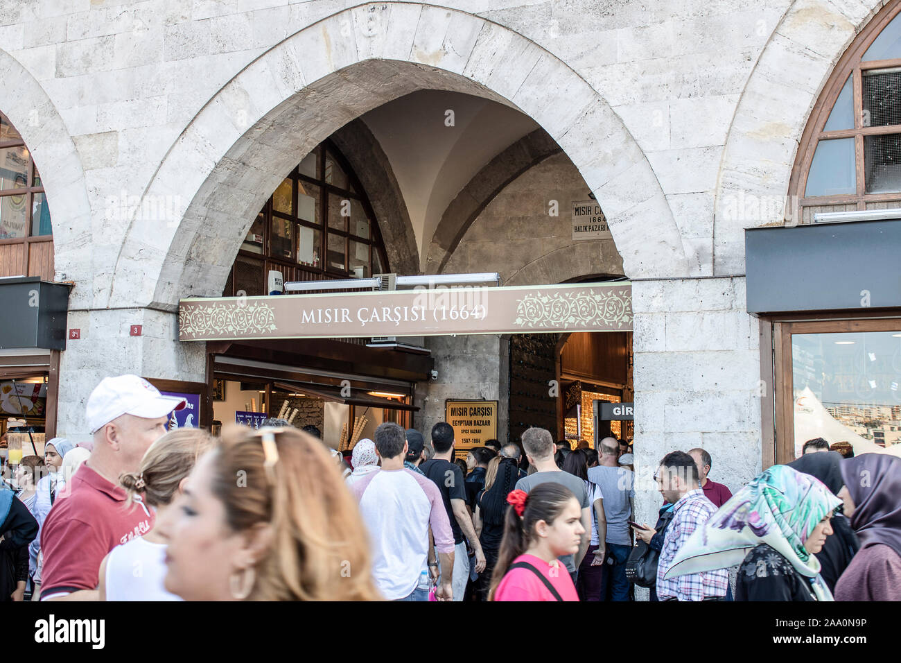 Istanbul, Turkey - September-28.2019: Shops and tourists in front of the main gate of the historic Egyptian Bazaar Egypt Carsisi . Stock Photo