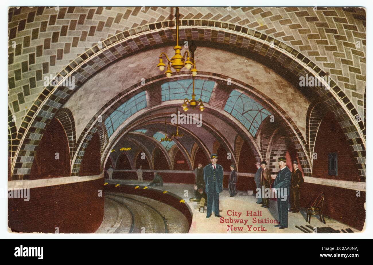 Illustrated postcard of railroad employees standing below the vaulted ceiling and skylight of the City Hall subway station, Manhattan, New York City, published by Success Postal Card Co, 1910. From the New York Public Library. () Stock Photo