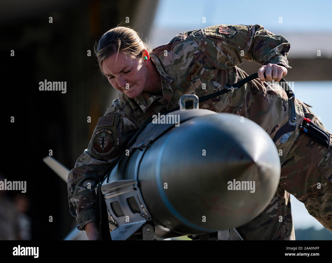 Staff Sgt. Danielle Zandi, 23rd Aircraft Maintenance Squadron weapons load crew chief, conducts a weapons-load demonstration during the 2019 Thunder Over South Georgia open house Nov. 3, 2019, at Moody Air Force Base, Ga. Approximately 50,000 people attended the two-day open house, which was headlined by the U.S. Navy Blue Angels demonstration team. Stock Photo
