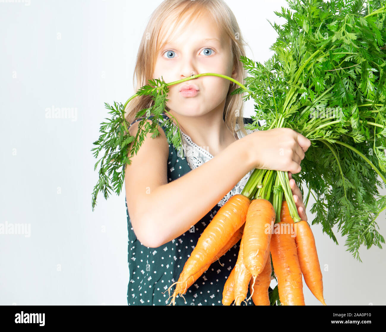 A child with a vegetable Stock Photo Alamy