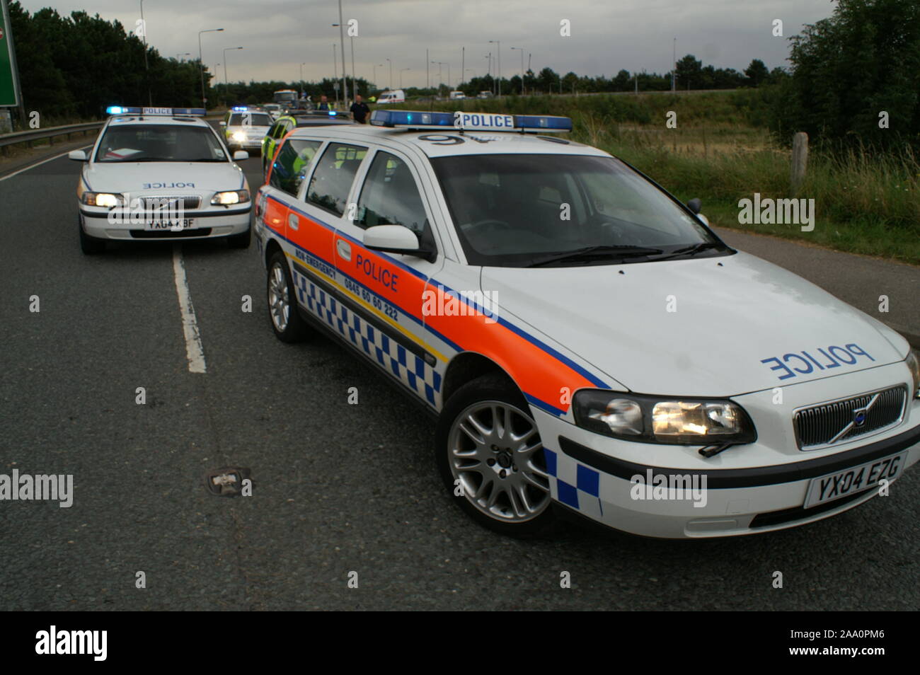 traffic police cars on motorway Stock Photo