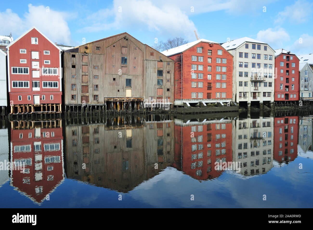 Trondheim Norway Europe March 18 2017: Riverside properties being reflected in a calm river Stock Photo