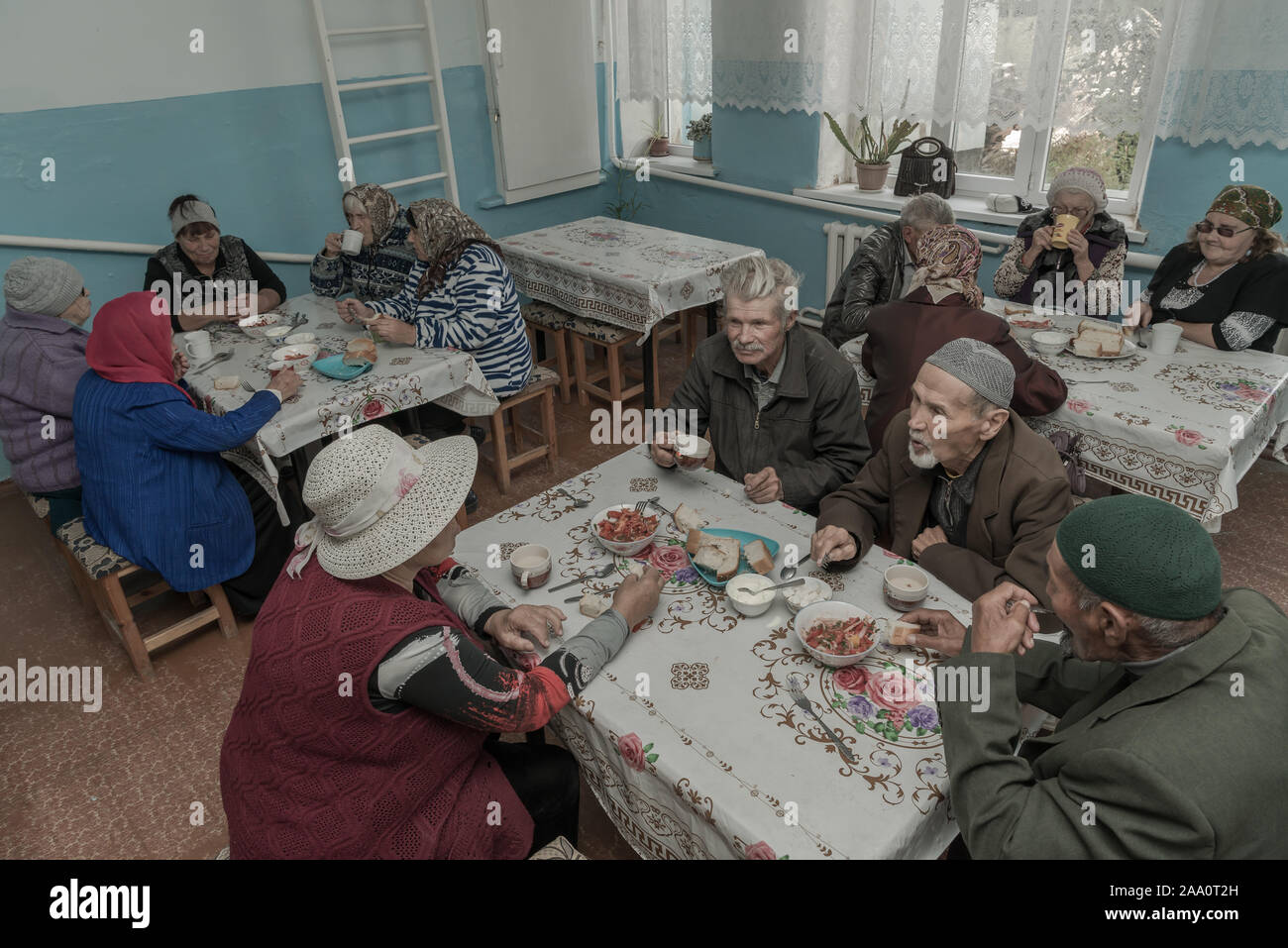 Pensioners at day centre, Kyrgyzstan Stock Photo