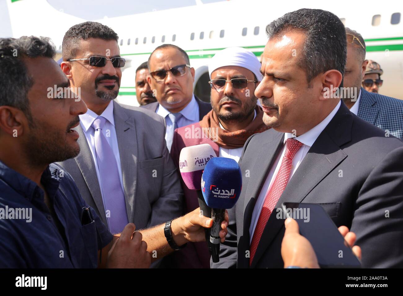 Aden. 18th Nov, 2019. Yemen's Prime Minister Maeen Abdulmalik (R, Front) is interviewed upon his arrival at Aden's International Airport, Yemen, on Nov. 18, 2019. Yemen's Prime Minister Maeen Abdulmalik and other ministers and government officials arrived on Monday in the country's southern port city of Aden. Credit: Xinhua/Alamy Live News Stock Photo