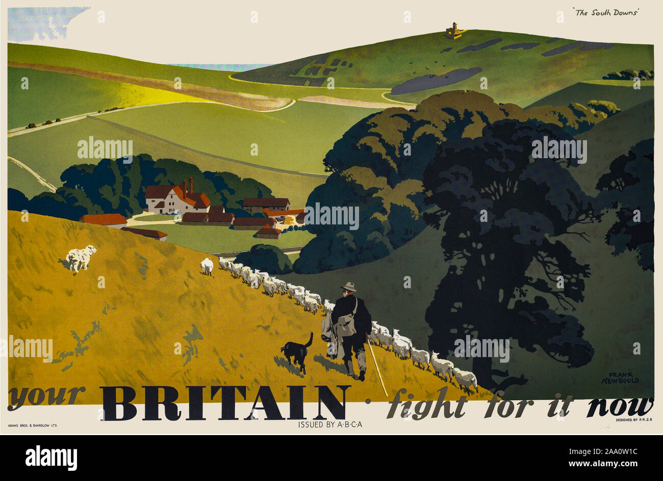 'Your Britain - fight for it now', a subtle World War Two recruitment poster depicting the bucolic British countryside featuring art by Frank Newbold. In it a shepherd and his dog drive sheep to a farm in the South Downs. Stock Photo