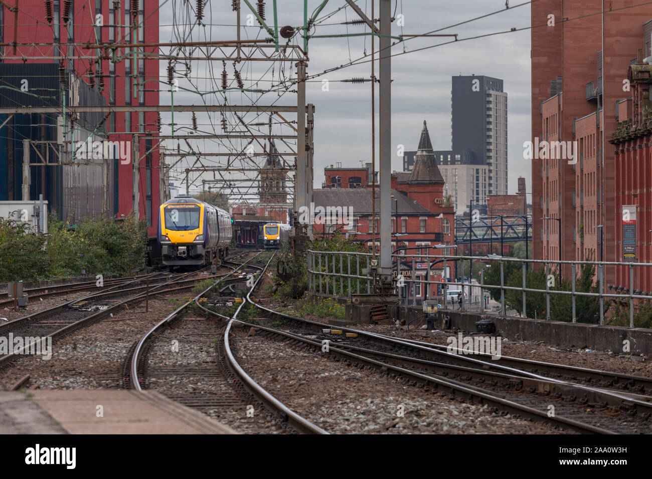 Arriva Northern rail class 195 trains passing on the congested 2 track