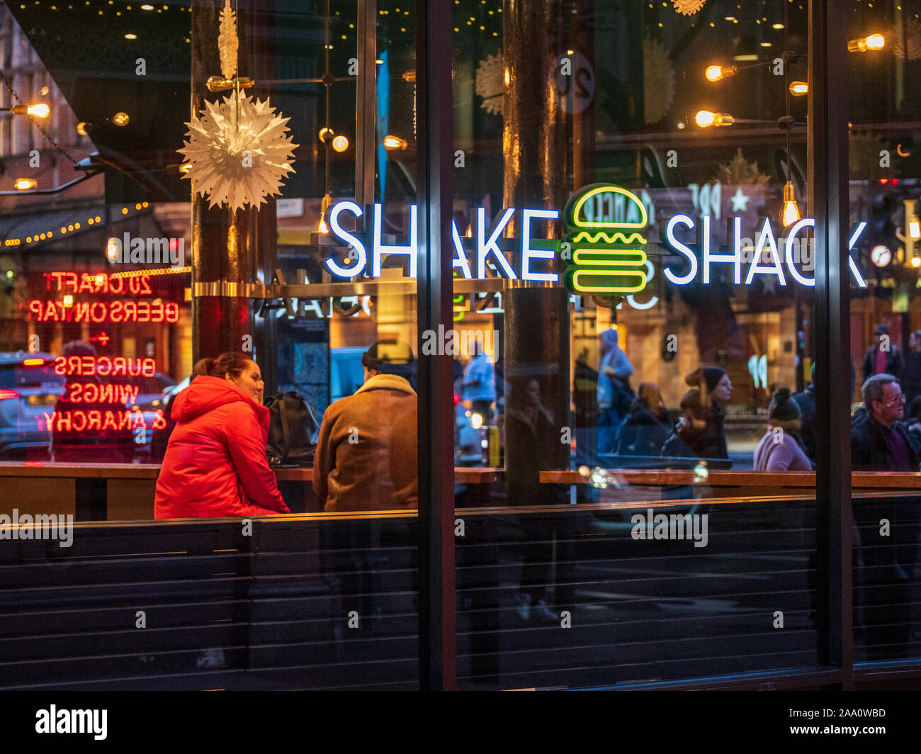 Shake Shack Soho London - London Soho branch of the US fast food restaurant chain on Cambridge Circus in London West End. Stock Photo