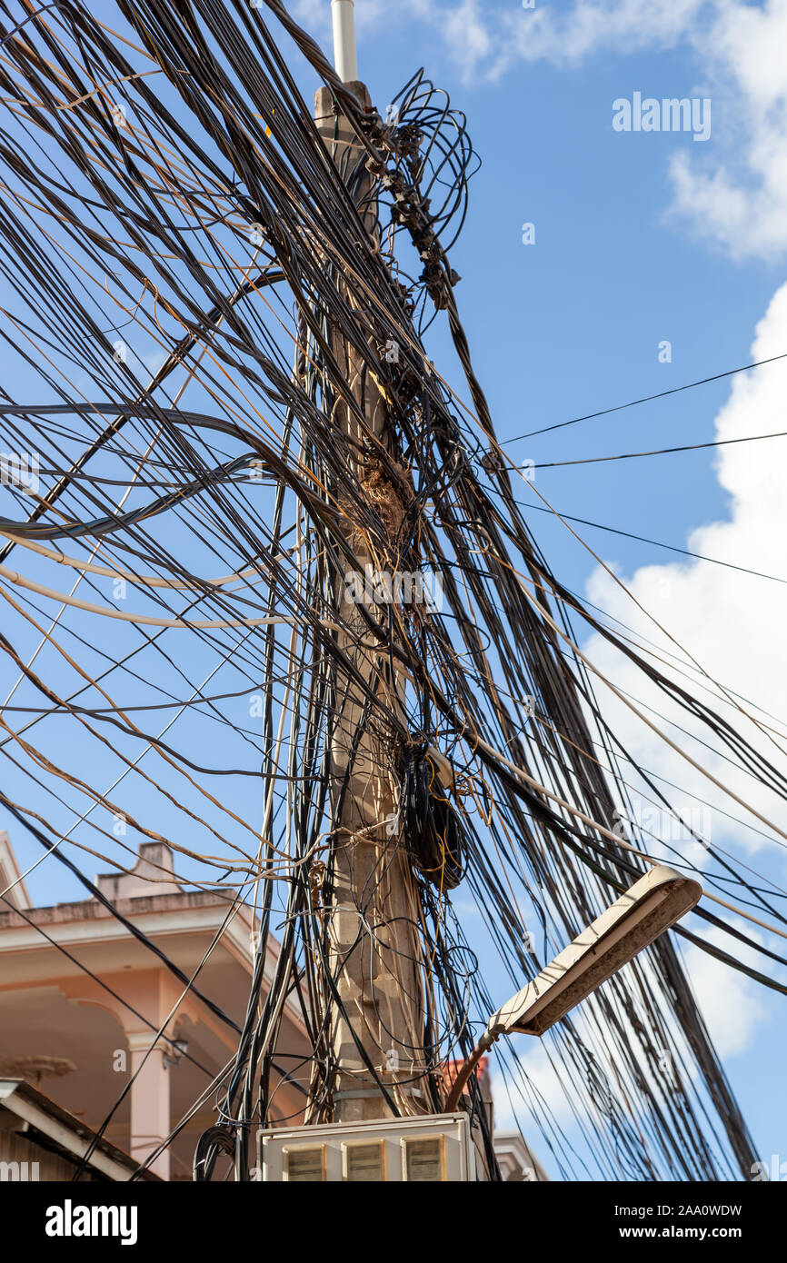 Wild electrical wiring. Typical scene in South East Asia. There is some  kind of order in this chaos Stock Photo - Alamy