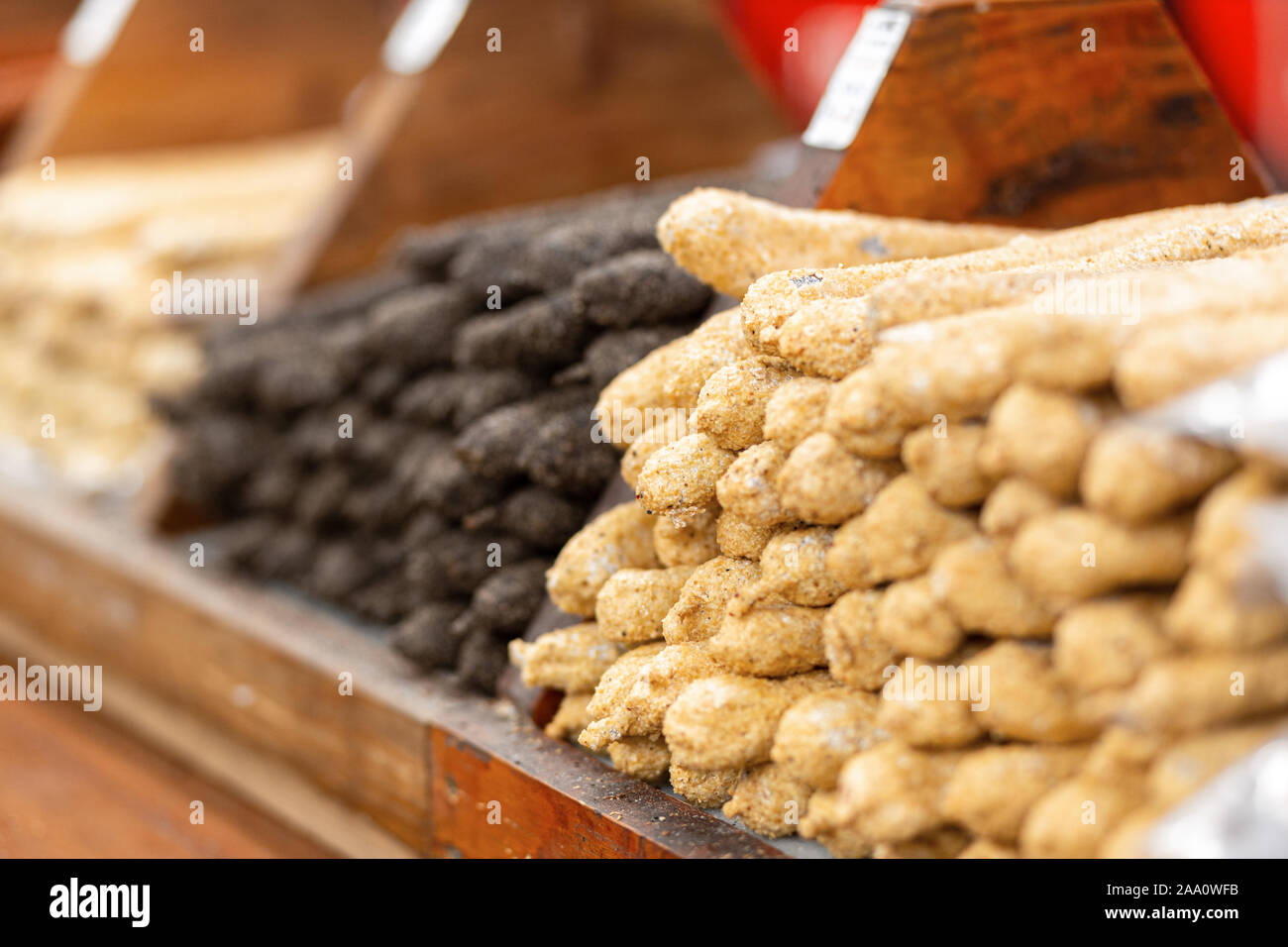 Selling smoked dried sausage in a shop in Spain. Stock Photo