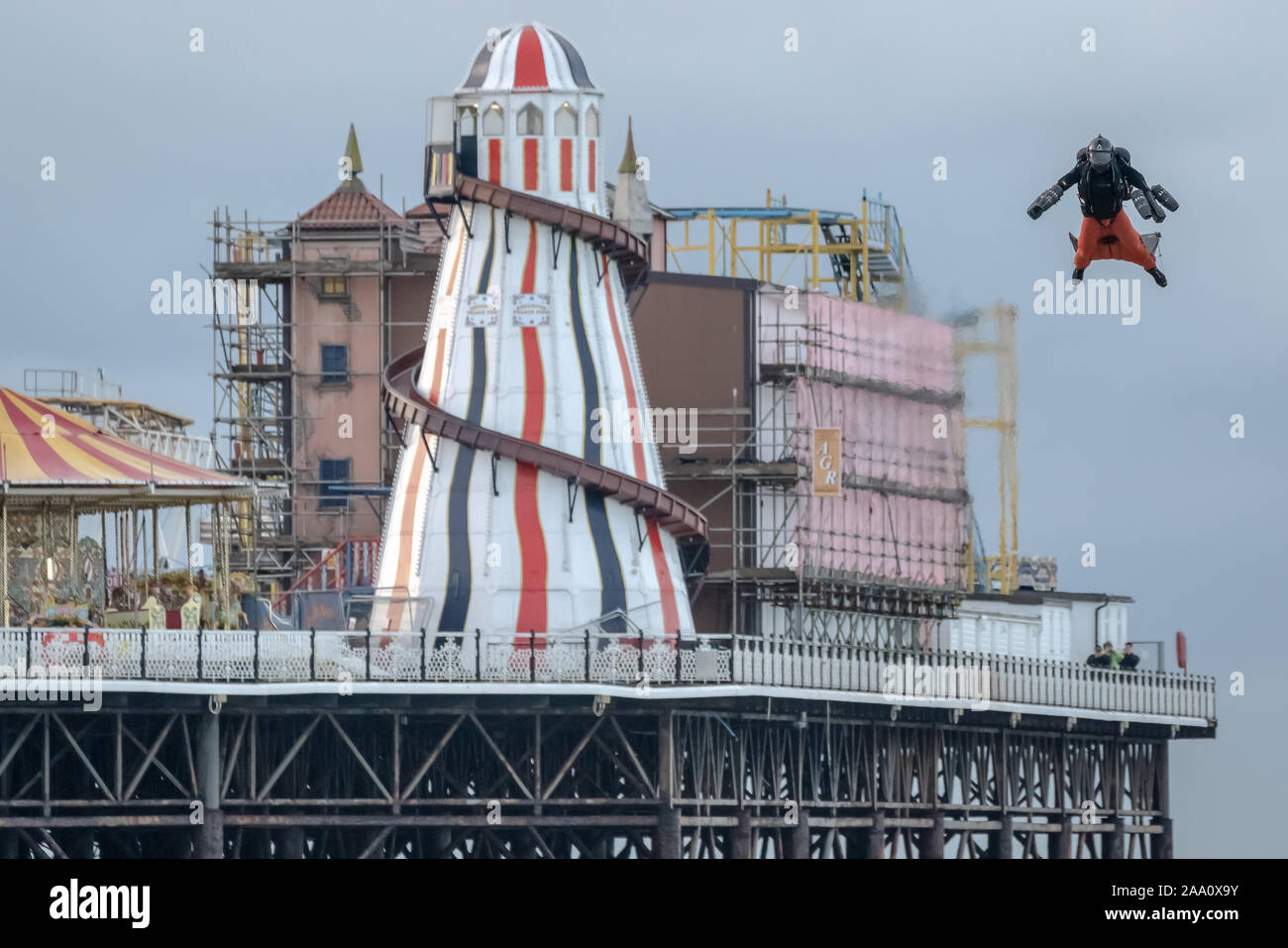 Richard Browning “Iron Man”, founder of Gravity Industries, makes a record-breaking flight in his body-controlled jet-powered suit over Brighton Pier. Stock Photo