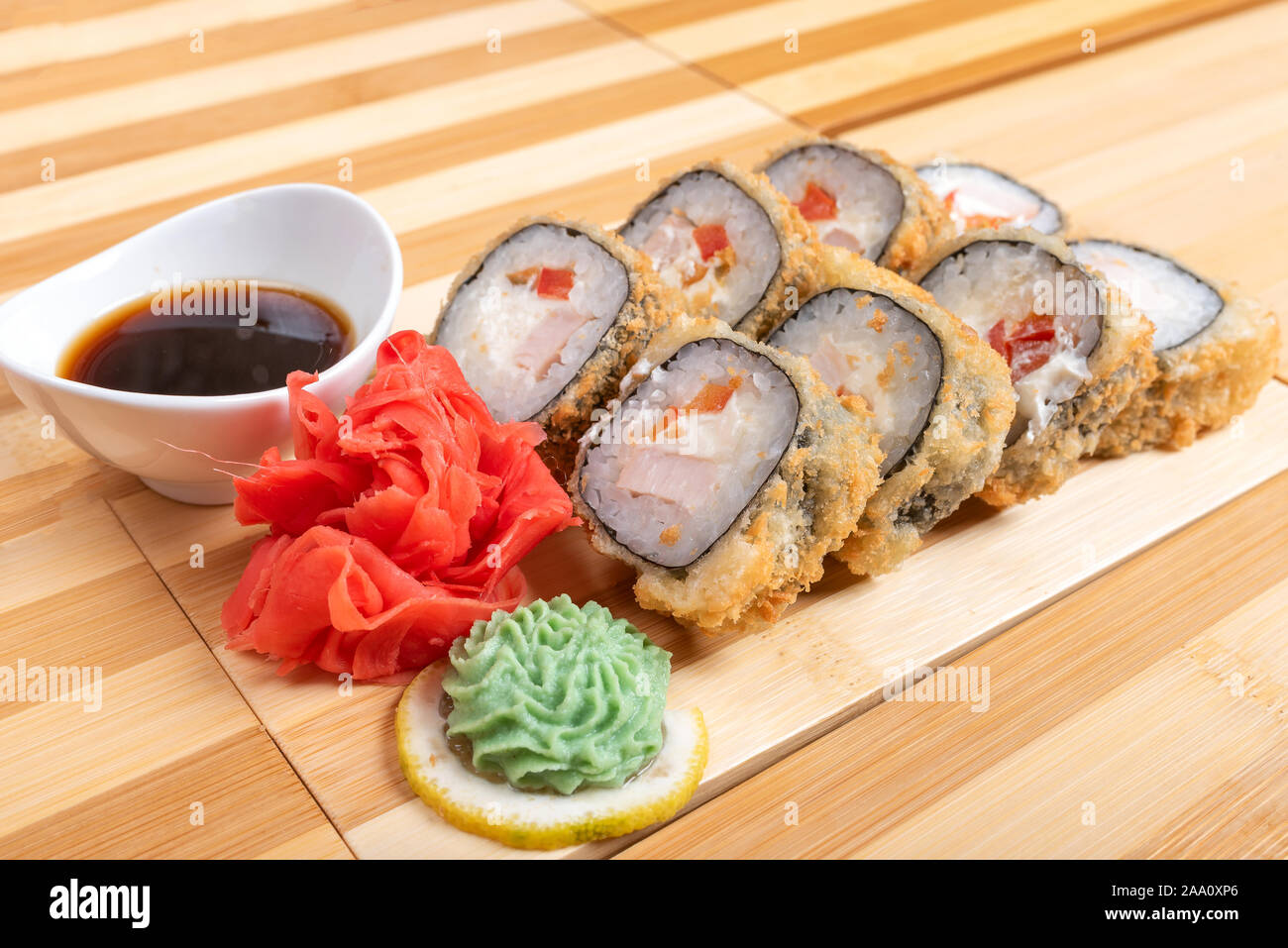 Baked salmon rolls. With ginger and wasabi Stock Photo Alamy
