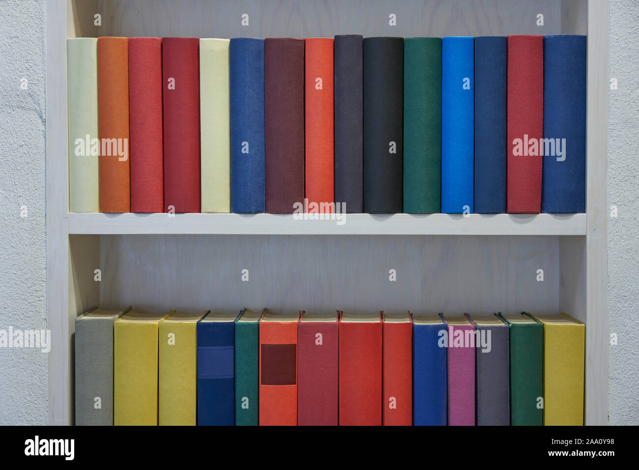 Accurate books in bookcase Stock Photo