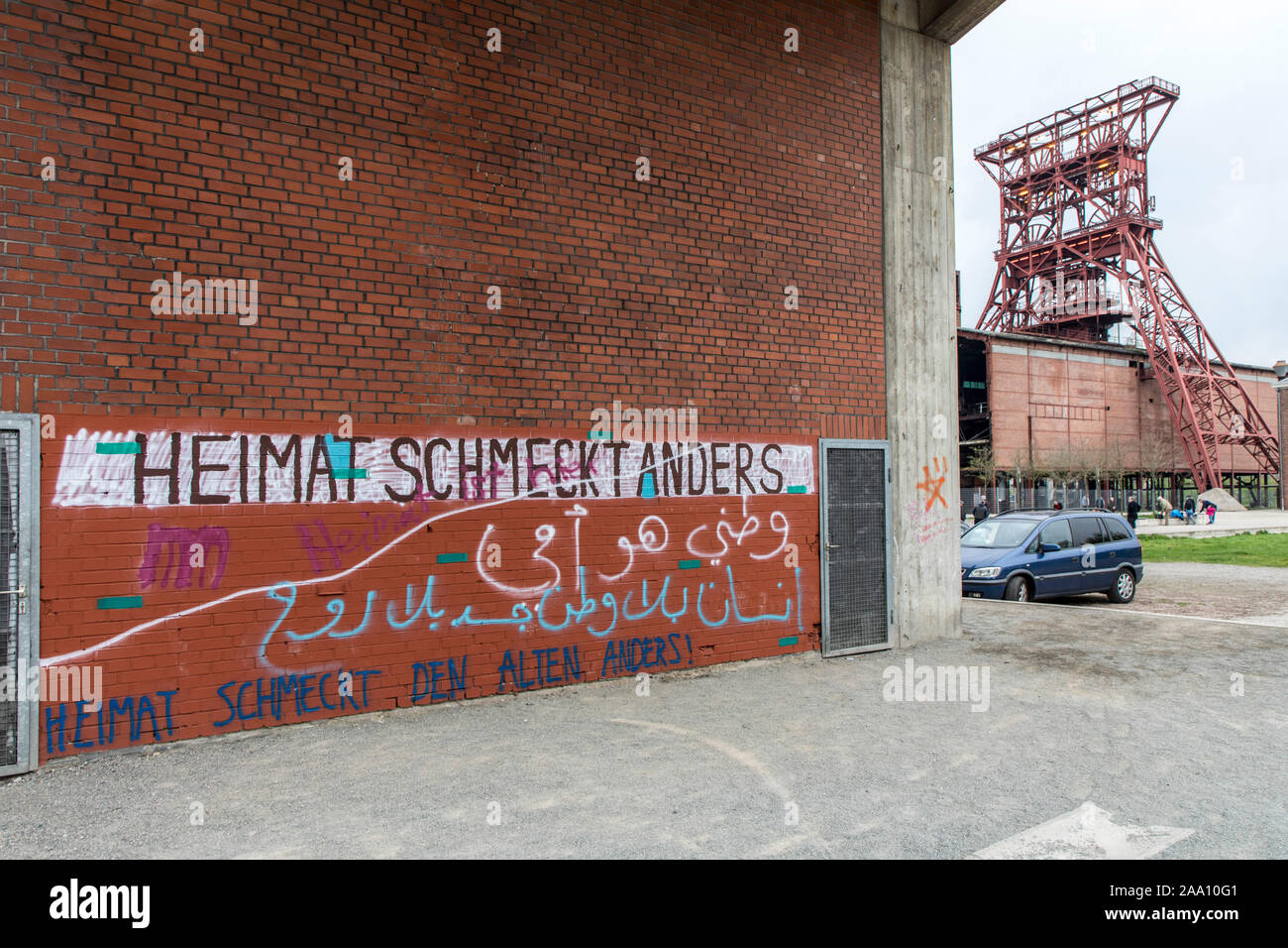 Graffiti on the subject of home, on a building on the site of the former Consolidation colliery, today Consol Park, in Gelsenkirchen, behind the windi Stock Photo