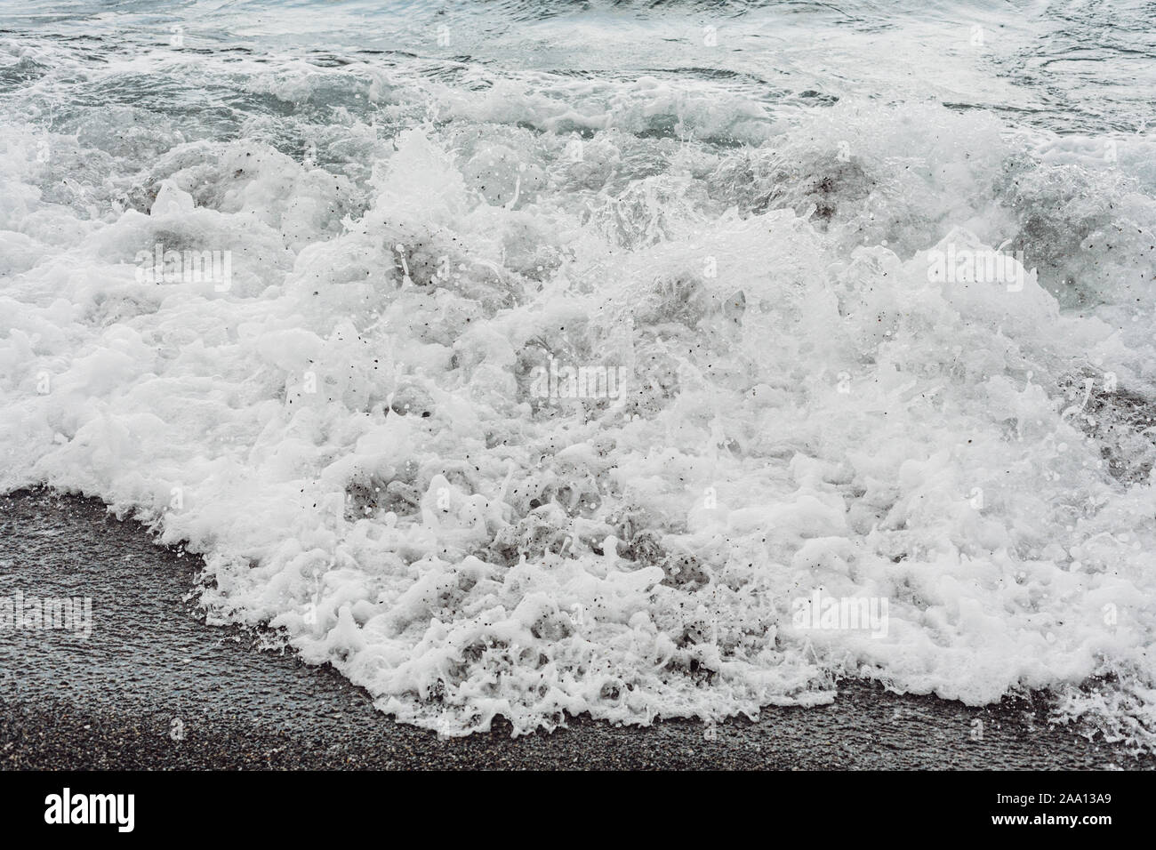 Sea foam on the beach hi-res stock photography and images - Alamy