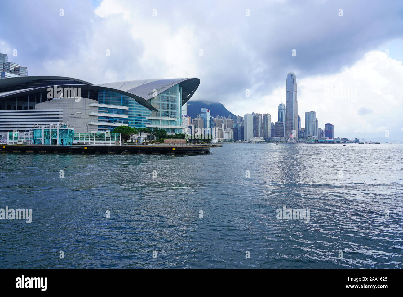 HONG KONG -29 JUN 2019- Day view the modern Hong Kong skyline near the Convention Center in Wan Chai as seen from the water in  Victoria Harbor. Stock Photo