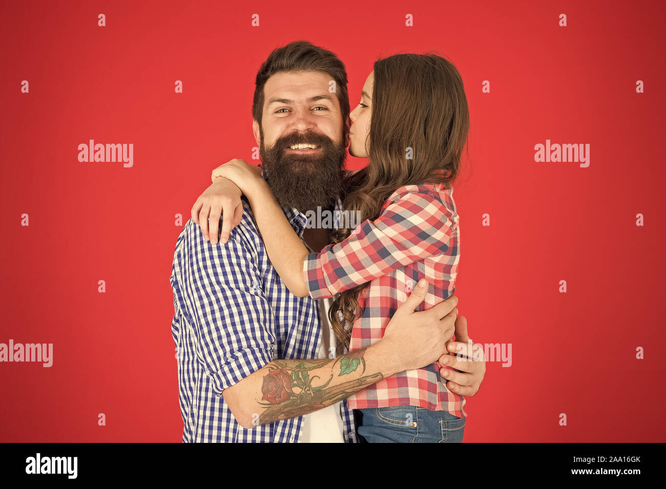 Spontaneous kiss. little child love her dad. Family bonds. fathers day