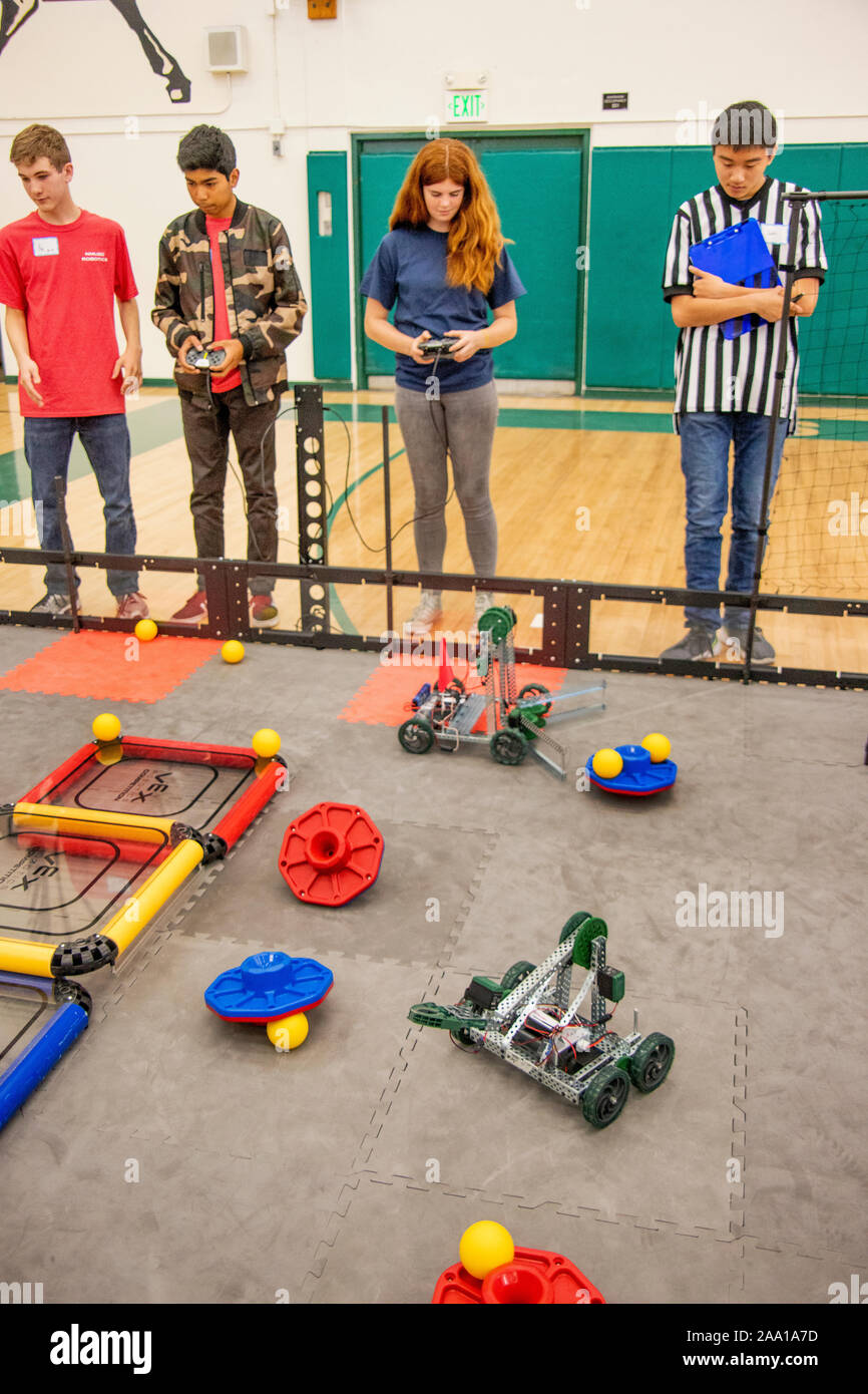 Students Gather Around The Turning Points Arena During A Robotics Stem Festival At A Costa Mesa Ca High School As They Direct Their Robots To Perform Ritualized Tasks Note Umpire In Striped Students Gather Around The Turning Points Arena During A Robotics Stem Festival At A Costa Mesa Ca High School As They Direct Their Robots To Perform Ritualized Tasks Note Umpire In Striped