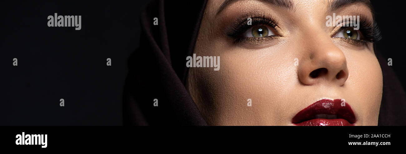 young Muslim woman in hijab with smoky eyes and red lips isolated on ...