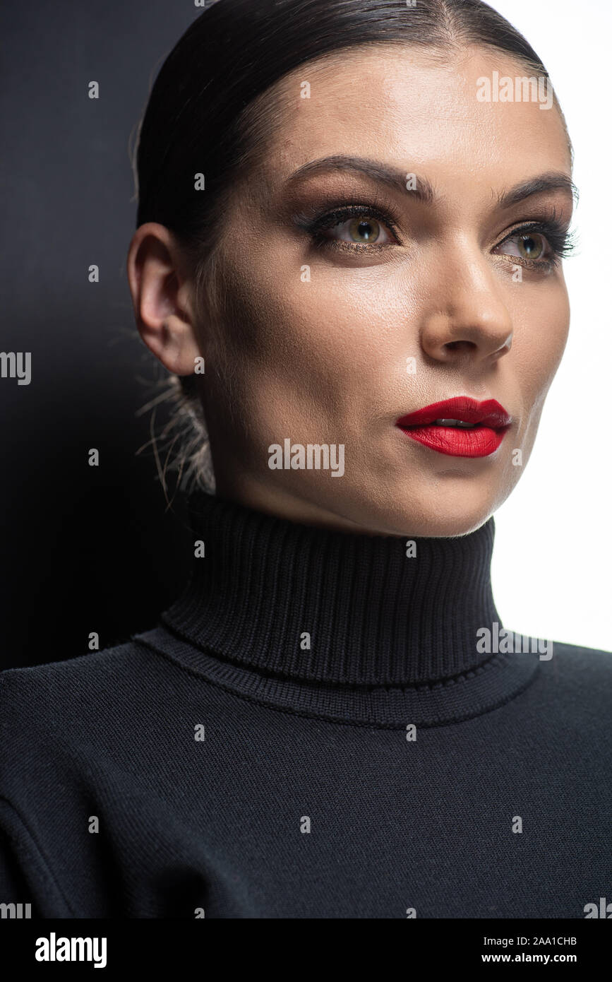 beautiful woman with red lips on white and black background Stock Photo ...