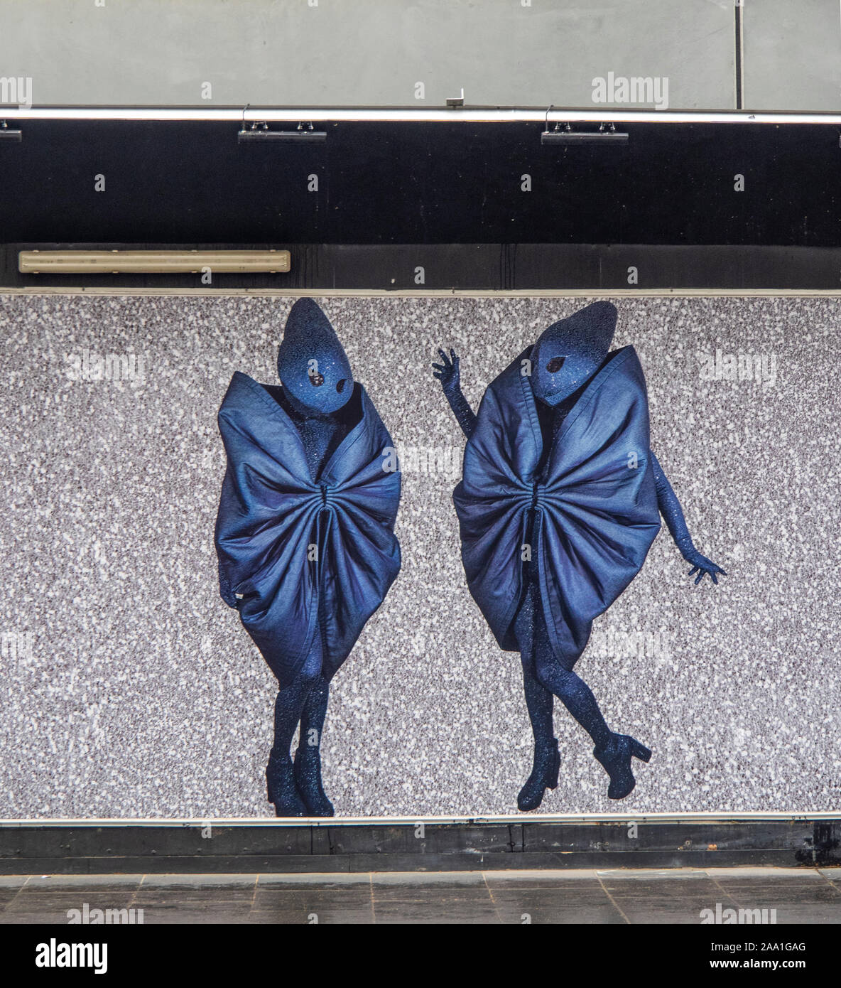 Street art mural of two alien like figures Stock Photo