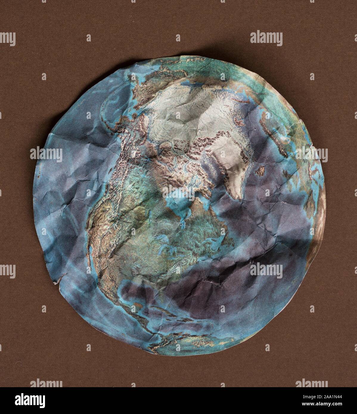 A crumpled paper earth. Stock Photo