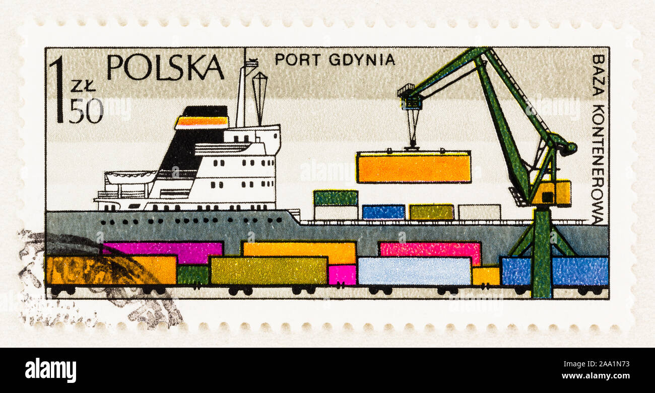 Polish postage stamp of ship at Port of Gdynia on the Baltic Sea. Cranes loading or unloading containers onto vessel. Scott # 2190, Stock Photo