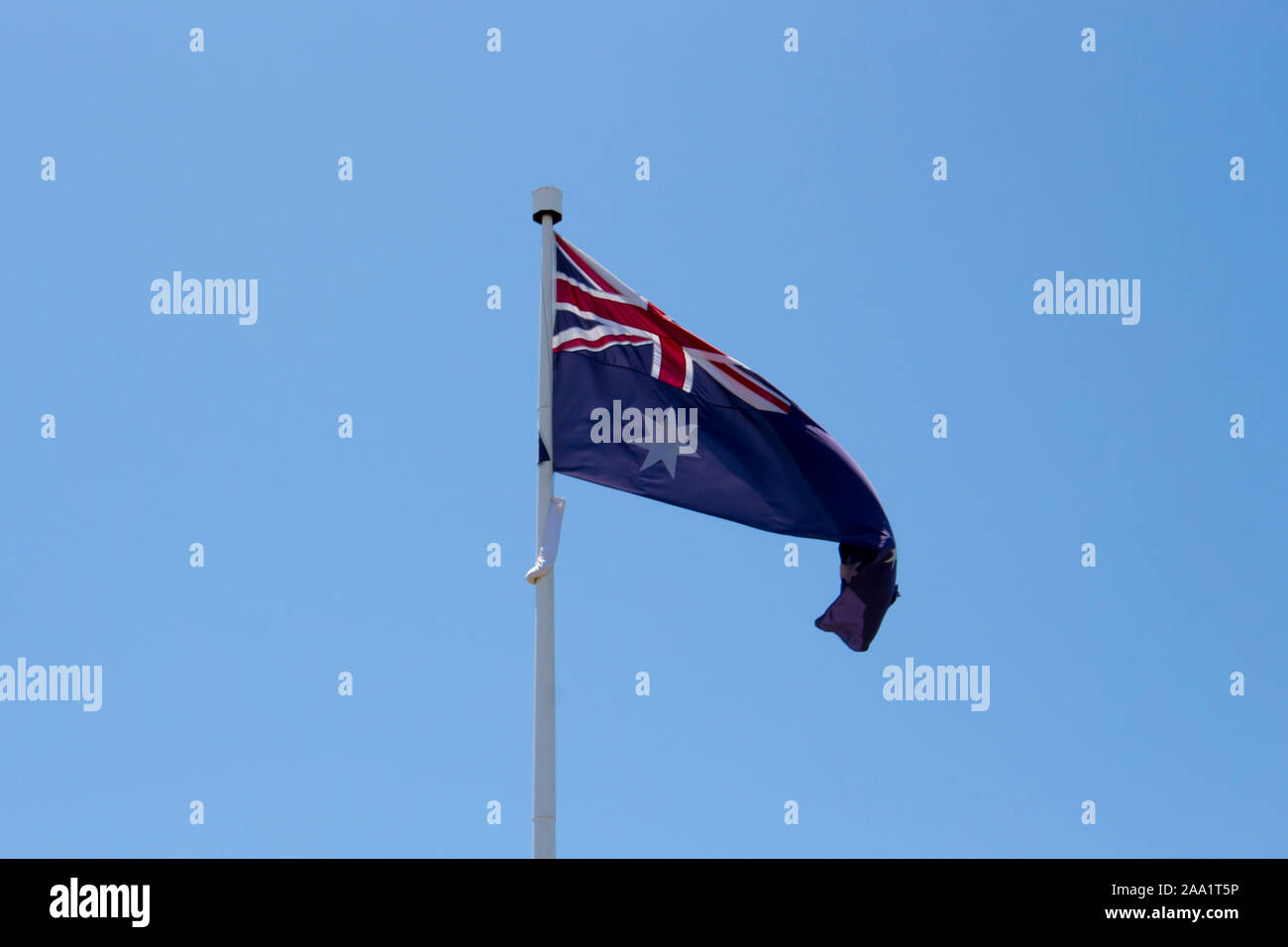 The flag of Australia is a defaced Blue Ensign, a blue field with a Union Jack in the and a large white seven-pointed star Stock Photo Alamy