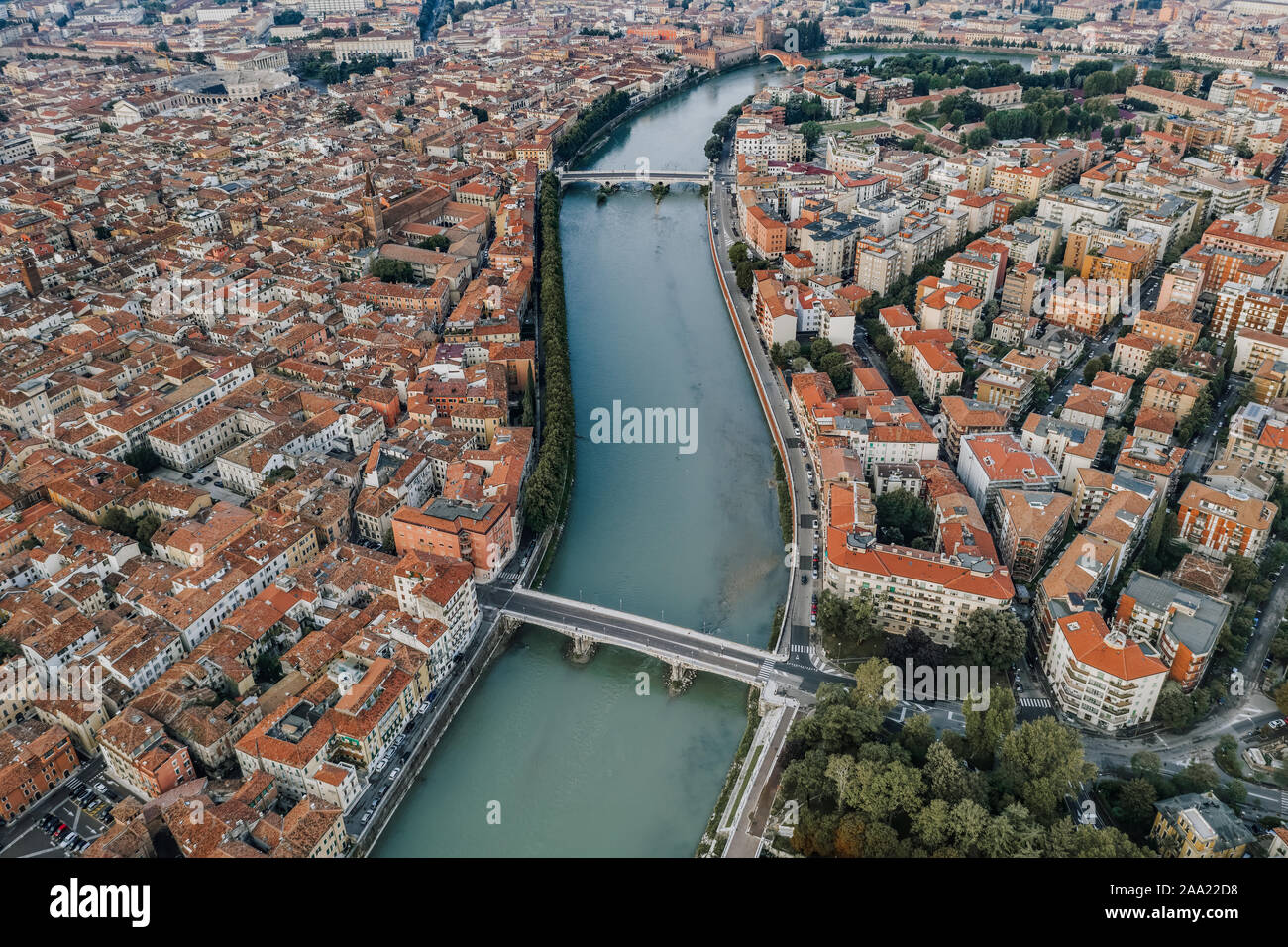 Aerial overhead drone shot view of Verona city with Adige river during ...