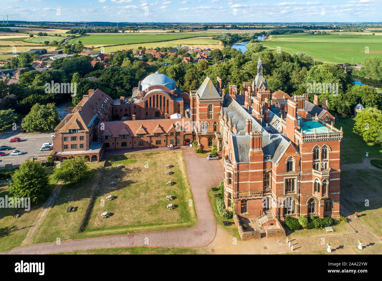 Kelham Hall - the  masterpiece of Victorian Gothic style near Newark-on-Trent with a hotel, conference center, spa, park and camping. Aerial view Stock Photo