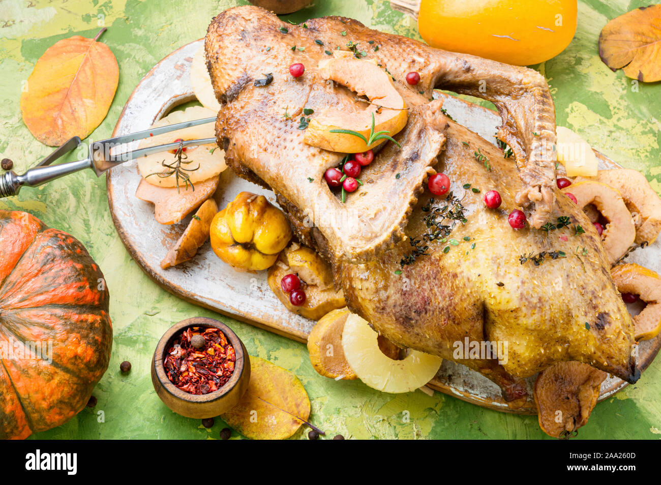 Baked whole duck with pineapple and quince Stock Photo - Alamy