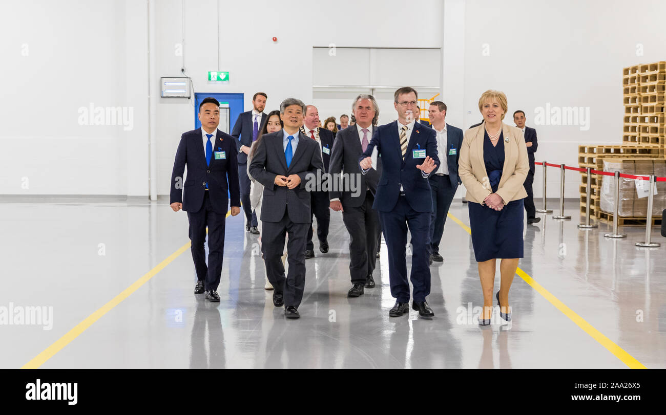 (191119) -- DUBLIN, Nov. 19, 2019 (Xinhua) -- Irish Minister for Business, Enterprise and Innovation Heather Humphreys(1st R in front) visits an infant formula plant in Monaghan, northeast Ireland, Nov. 18, 2019. A ceremony to mark the completion of the construction of the infant formula production factory by a Chinese company was held in Ireland's northeast County Monaghan on Monday. Located in Carrickmacross, the second largest town in County Monaghan, the new factory with an investment of over 20 million euros (about 22 million U.S. dollars), which is fully funded by Shanghai Newbaze Dai Stock Photo