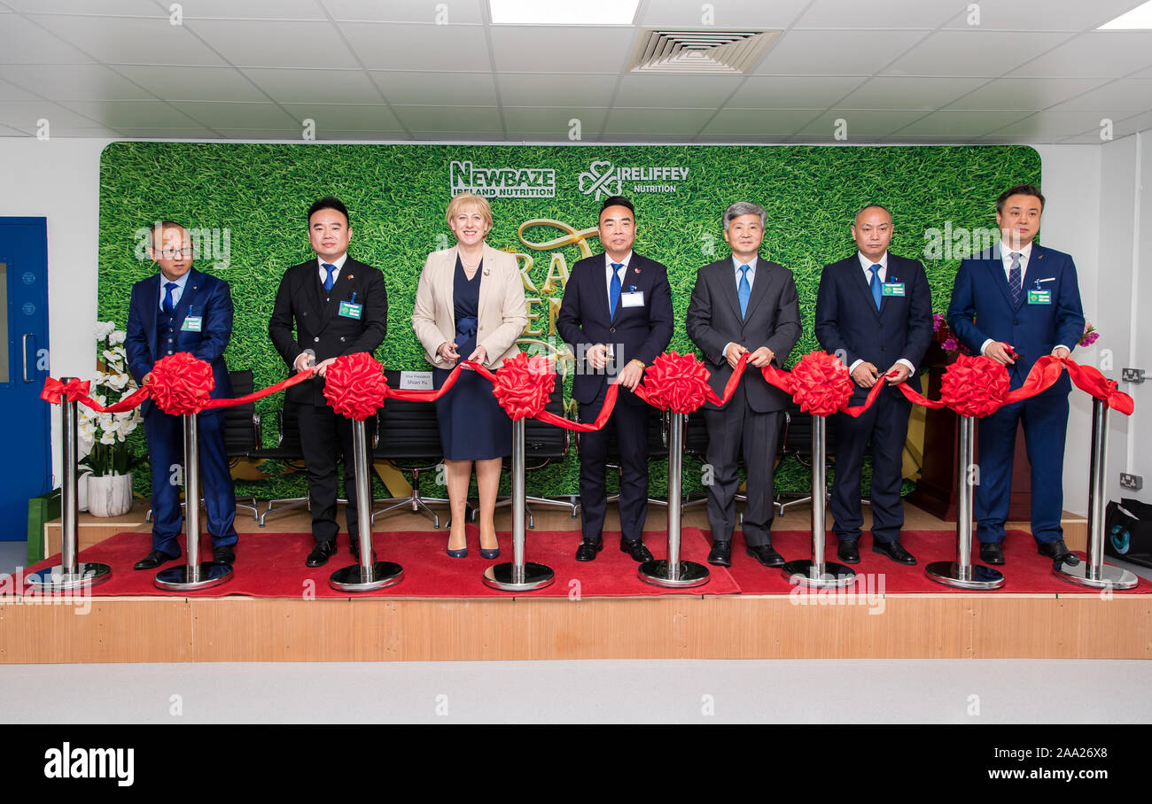 (191119) -- DUBLIN, Nov. 19, 2019 (Xinhua) -- Irish Minister for Business, Enterprise and Innovation Heather Humphreys (3rd L) and Chinese Ambassador to Ireland He Xiangdong (3rd R) attend a ceremony to mark the completion of the construction of an infant formula plant in Monaghan, northeast Ireland, Nov. 18, 2019. A ceremony to mark the completion of the construction of the infant formula production factory by a Chinese company was held in Ireland's northeast County Monaghan on Monday. Located in Carrickmacross, the second largest town in County Monaghan, the new factory with an investment Stock Photo