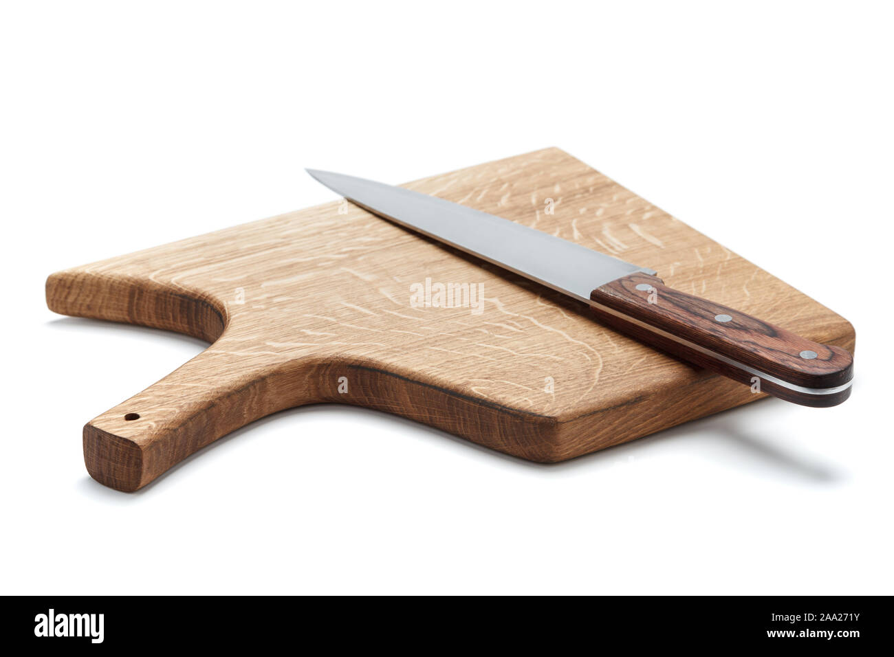 Kitchen Knife Lying On A Cutting Board, White Background Stock Photo ...