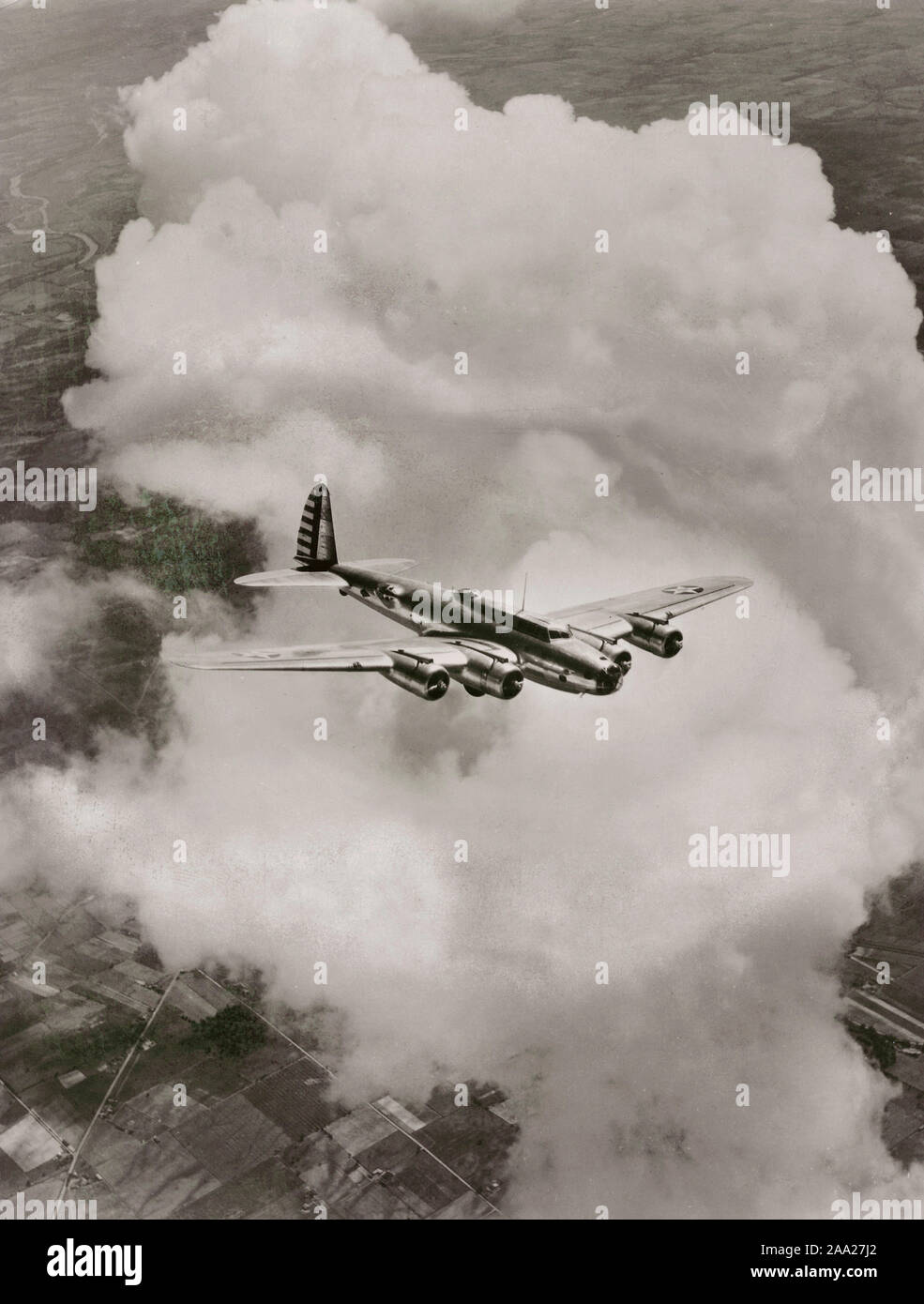 Airplane history. An american airplane model Boeing B-17 Flying fortress in the air. During World War II the bomb aircraft dropped over 650240 tons of bombs on the enemy. 1943 Stock Photo