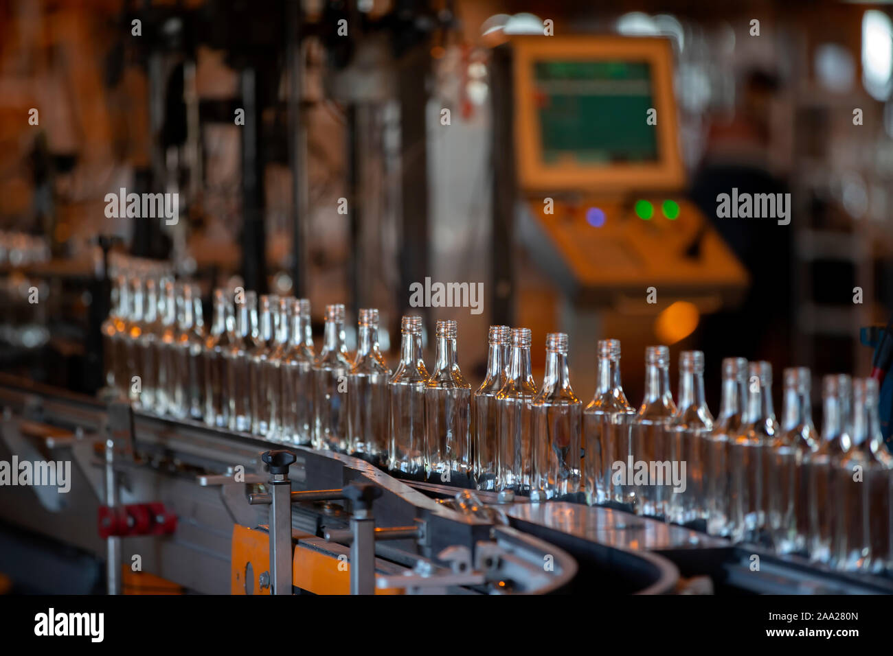 Glassworks. Glass industry. Many glass bottles on an industrial