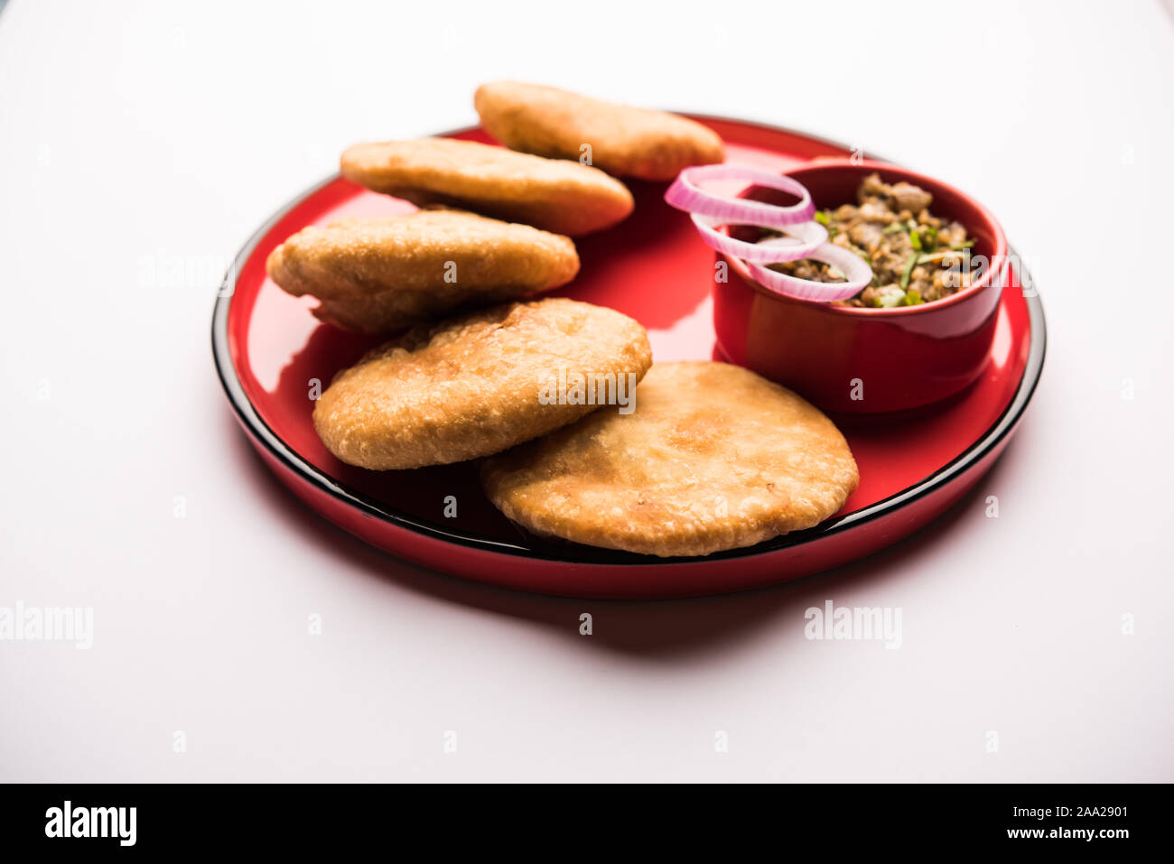 Fried Sattu Litti chokha served with Baingan Bharta, onion and pickle