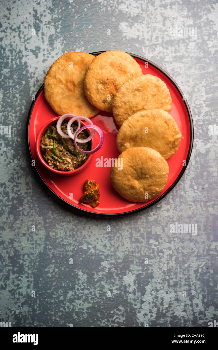 Fried Sattu Litti chokha served with Baingan Bharta, onion and pickle
