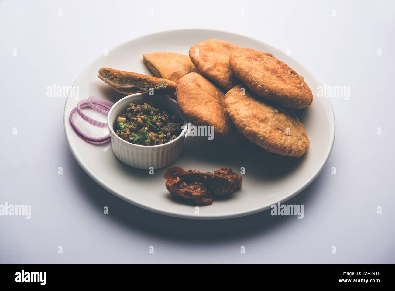 Fried Sattu Litti chokha served with Baingan Bharta, onion and pickle