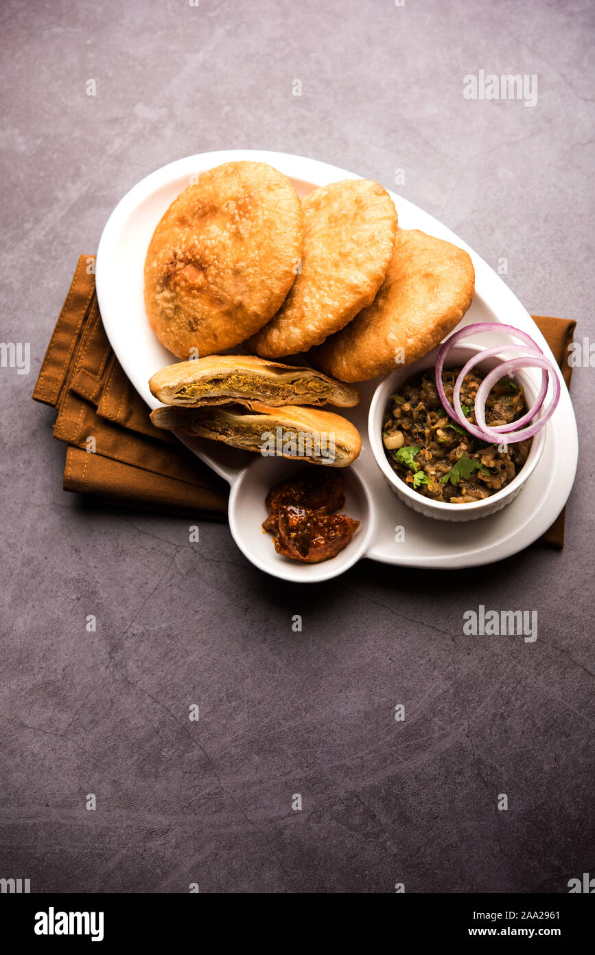 Fried Sattu Litti chokha served with Baingan Bharta, onion and pickle