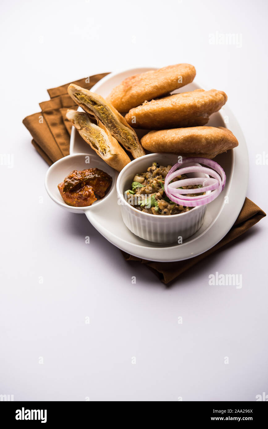 Fried Sattu Litti chokha served with Baingan Bharta, onion and pickle