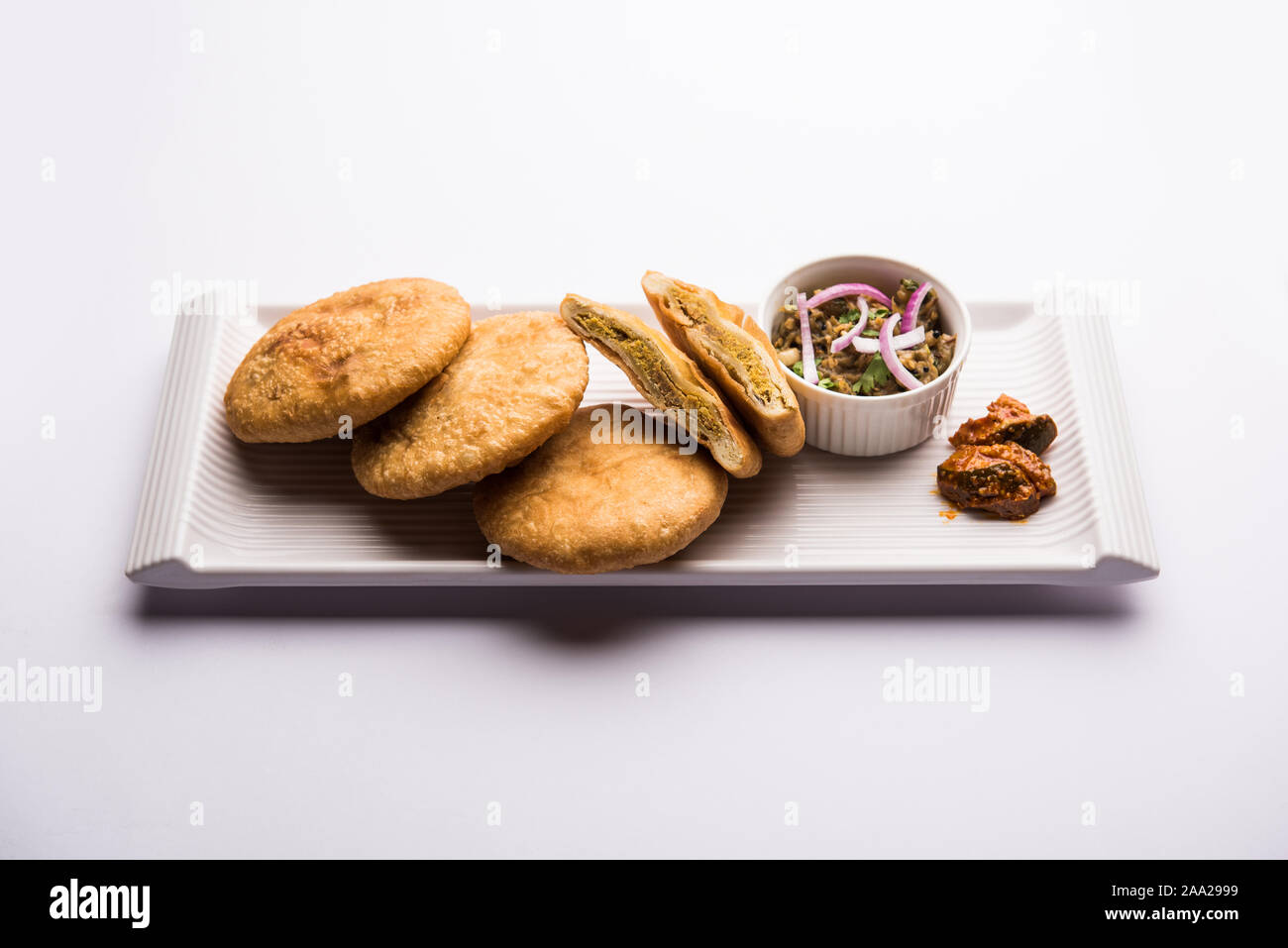 Fried Sattu Litti chokha served with Baingan Bharta, onion and pickle