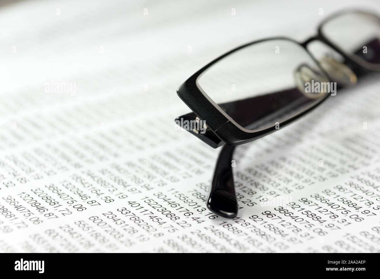 Glasses and a spreadsheet Stock Photo