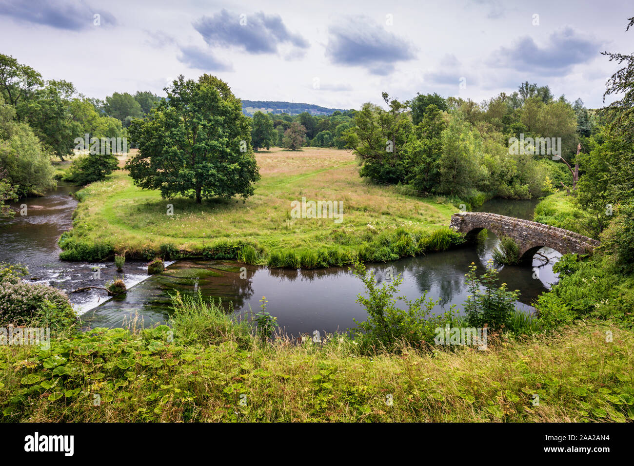 View from Haddon Hall over the estate and the bridge across the River Wye near Bakewell, Derbyshire, England, UK Stock Photo