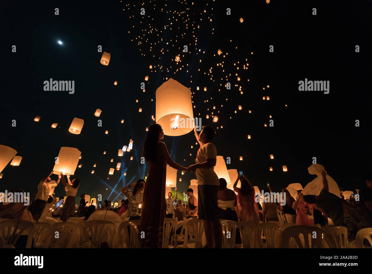 A couple who is going to release a lantern during Chiang Mai lantern