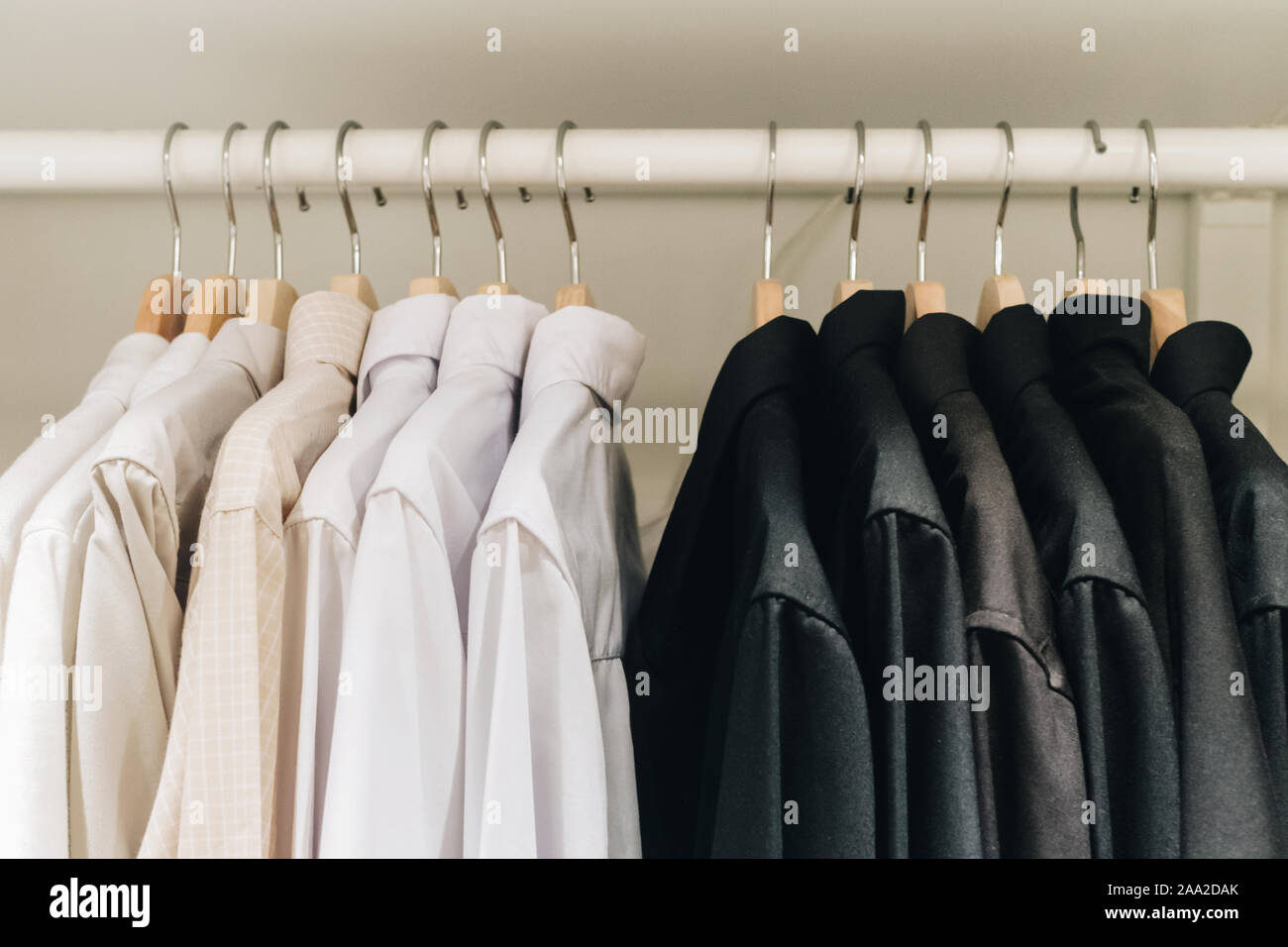 White shirts cupboard hi res stock photography and images Alamy